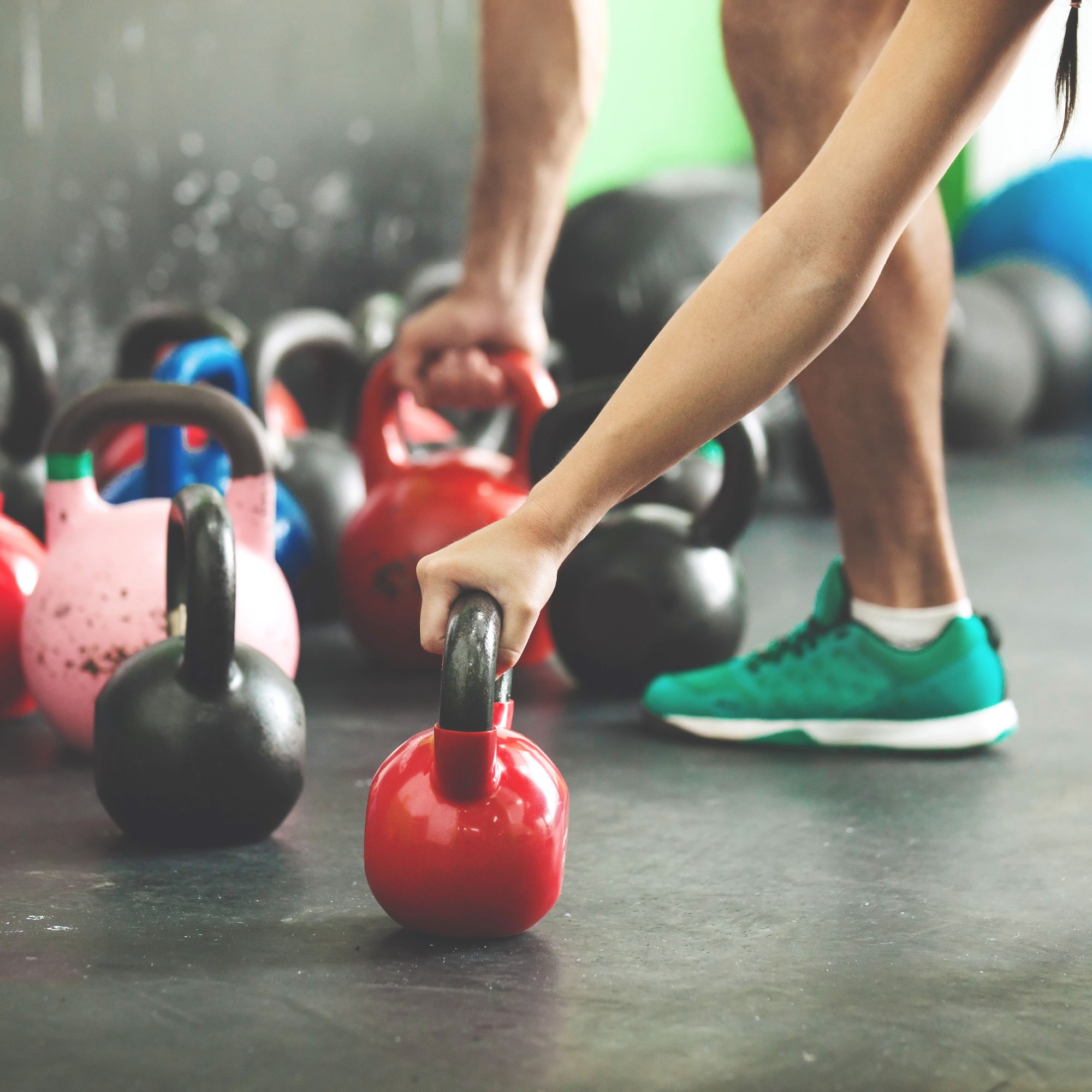 two members doing strength training together during a partner personal training session