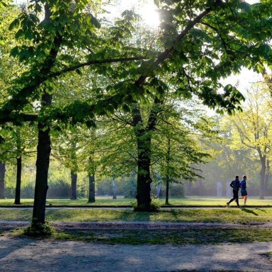 Two people working out together for added motivation during the colder months