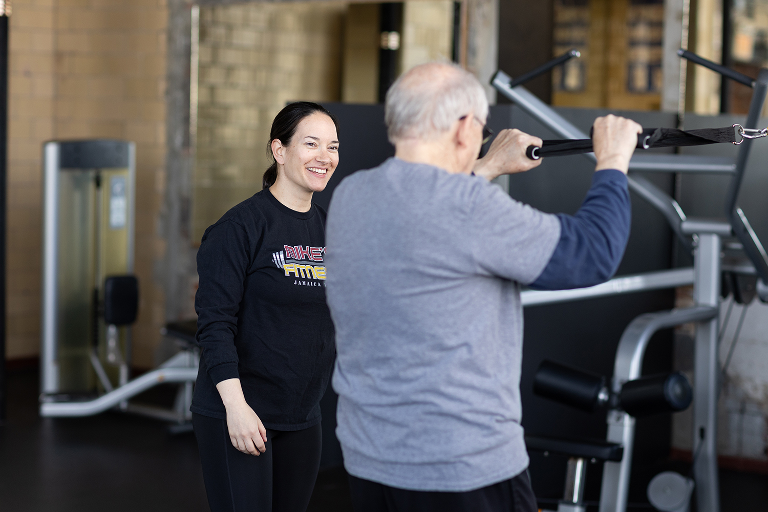 Member showing fall fitness motivation in Jamaica Plain at Mike’s Fitness JP.