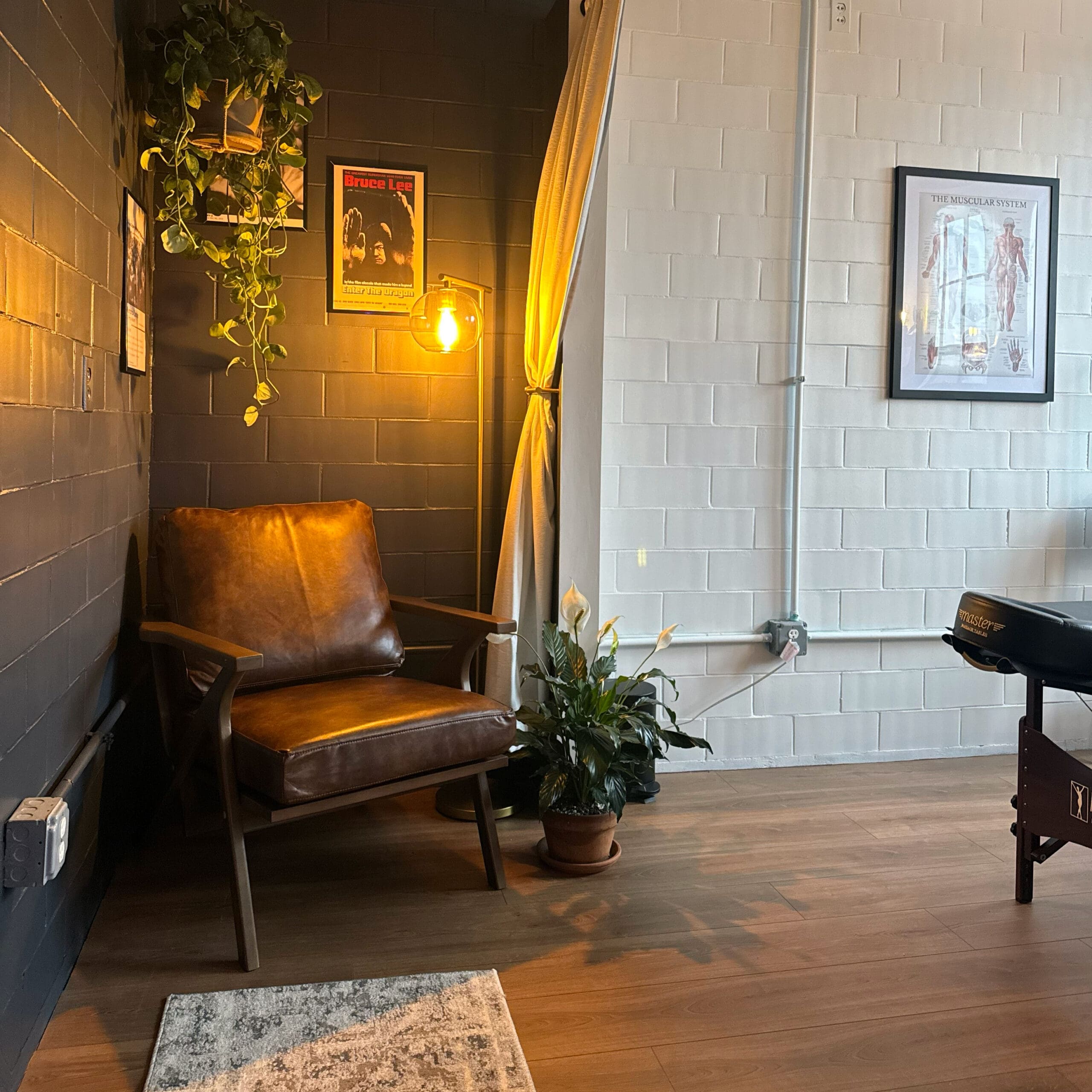 Massage therapy room at The Treatment Room inside Mike’s Fitness JP in Jamaica Plain
