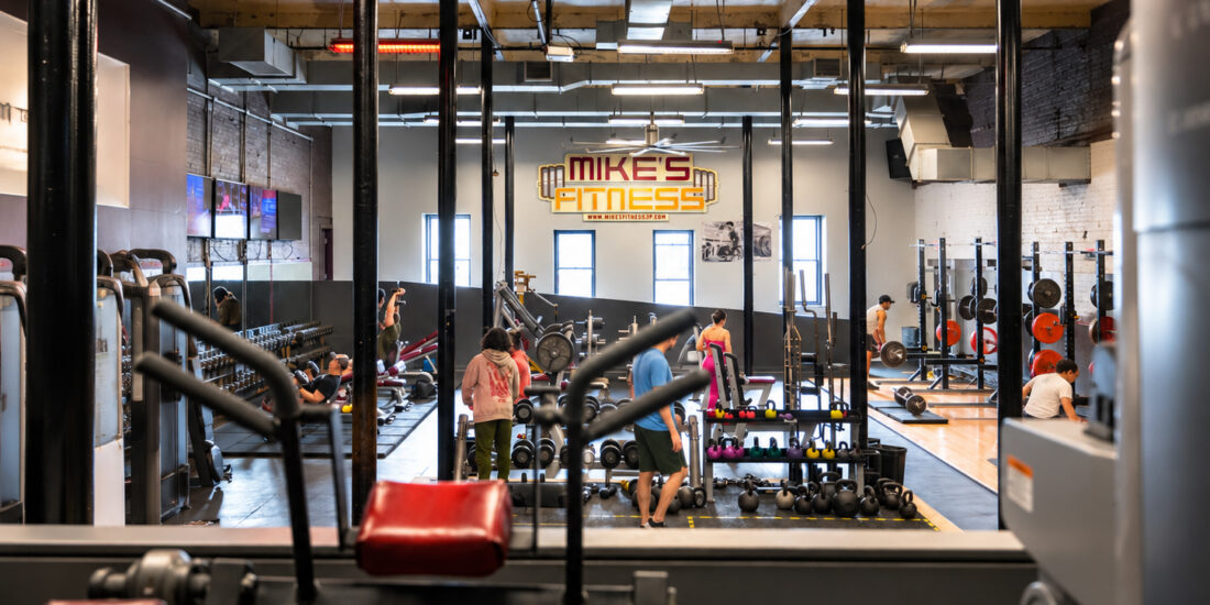 Maintenance staff helping maintain Mike's Fitness JP gym in Jamaica Plain